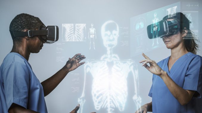 Doctors wearing VR simulation with hologram medical technology